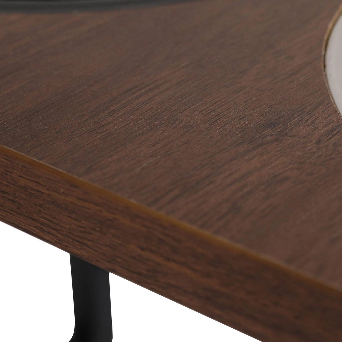 Close-up of the walnut-look top and steel frame