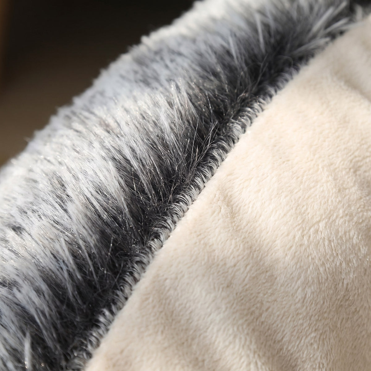 Close-up of the long-pile faux fur outer and soft cream lining on The Burrow | PawHaus Co