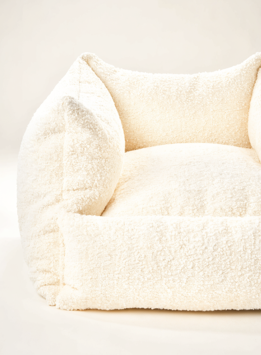 The Haven Bolster in Cream Boucle — luxury bolster dog bed