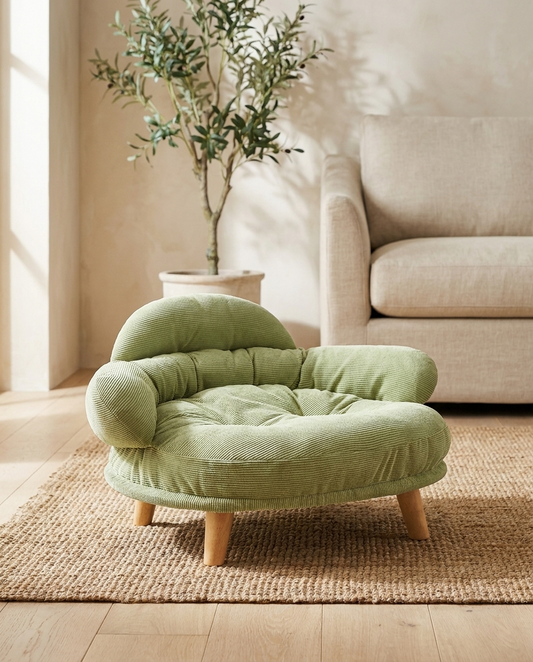 The Cocoon Lounge sage green corduroy pet sofa bed in a Scandi living room | PawHaus Co |c:Sage Green