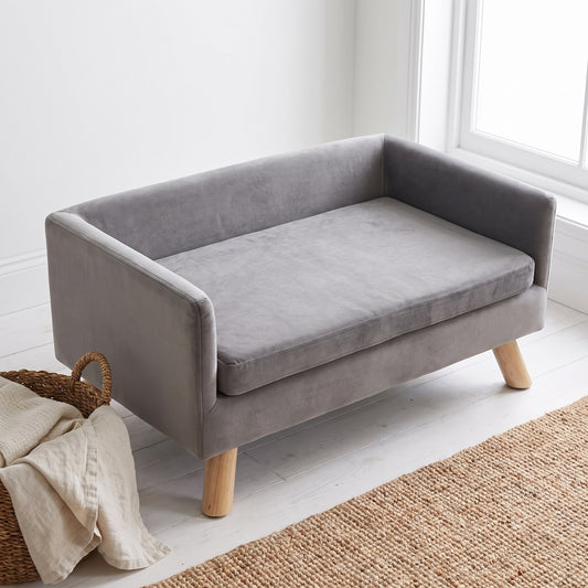 The Lounge dog sofa from above, showing the open front, seat cushion and four timber legs | PawHaus Co
